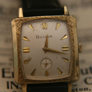 Rare vintage men's 1963 gold Bulova Senator fancy case wristwatch.  A rare, well-preserved classic that is running great!