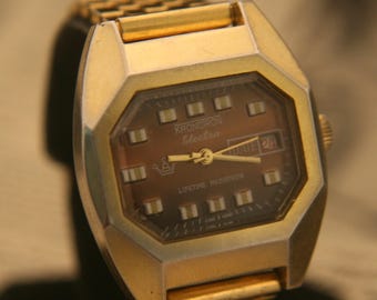 Vintage 1980's Kronotron Electra Datomatic men's chocolate dial wristwatch, runs