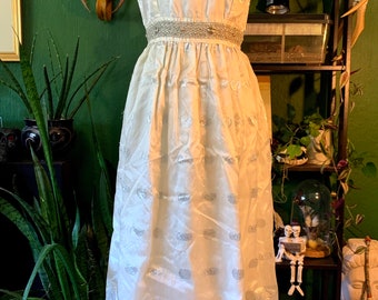 Vintage silvery white short sleeve gown with metallic detailing bridal