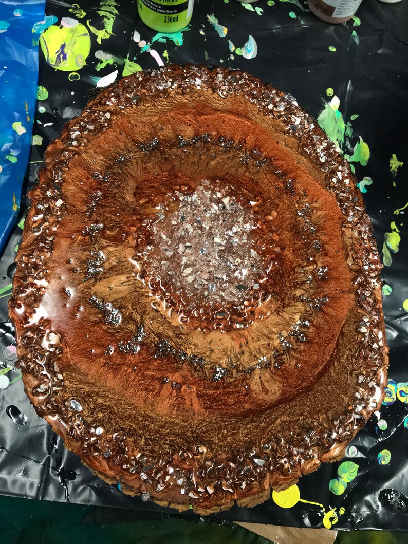 Tree ring glass crystal and diamond crystal resin pour on real wood slab.