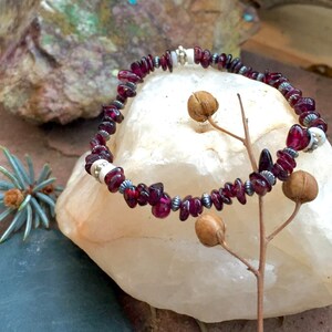 garnet stretch bracelet with sterling silver and shell