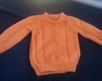 Hand knit child sweater