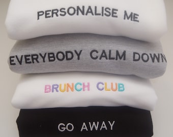 Custom text embroidered sweatshirt.