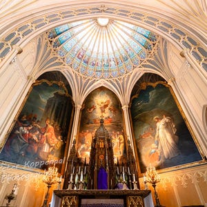 May include: The interior of a church with a stained glass dome and ornate arches. The walls are painted with religious scenes, including a depiction of Jesus ascending to heaven. The altar is decorated with candles and a purple cloth.