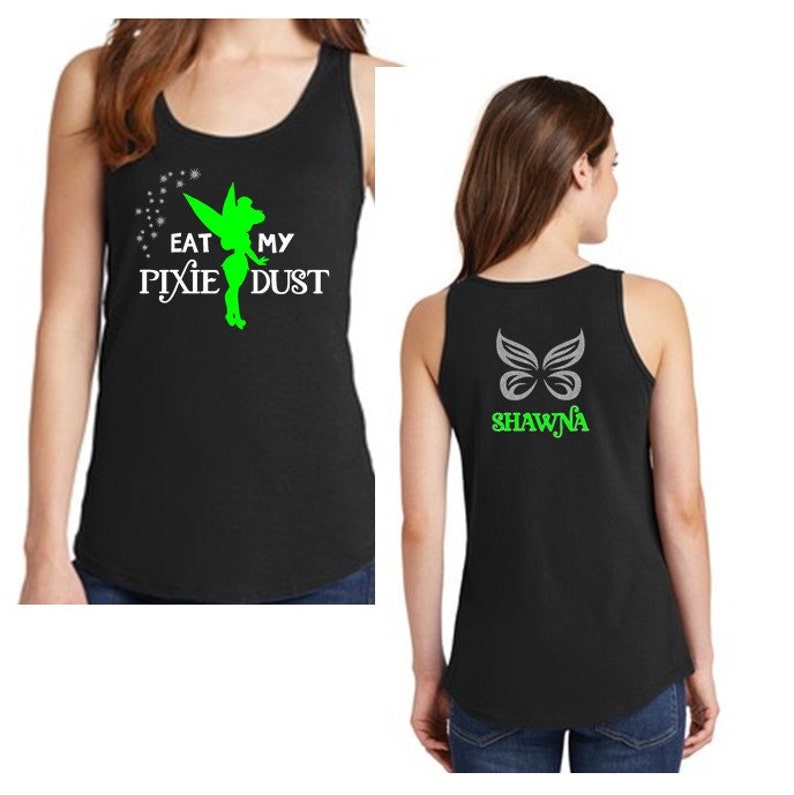 May include: Black tank top with a green Tinkerbell graphic and the text "Eat My Pixie Dust" on the front. The back of the tank top has a silver butterfly graphic and the name "Shawna" in green text.