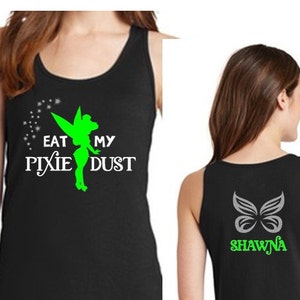 May include: Black tank top with a green Tinkerbell silhouette and the text "Eat My Pixie Dust". The back of the tank top has a silver butterfly and the text "Shawna" in green.