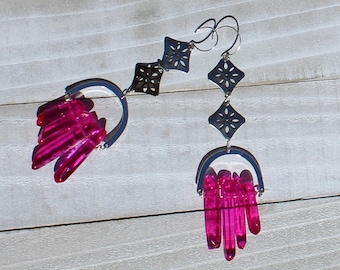 Silver flower medallion and hot pink aura quartz points suspended from silver u shaped findings and 925 sterling silver earwires