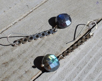 Labradorite faceted coin shaped stone suspended from silver bubble bars on silver 925 sterling silver french hooks