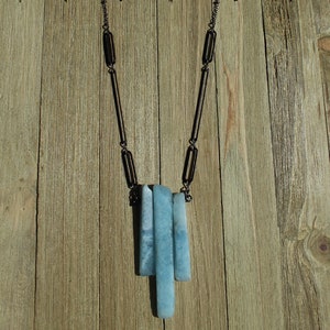 Raw aquamarine stick bead pendant with gunmetal geometric shapes on long gunmetal chain image 1