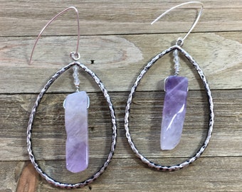 Chunky large amethyst tooth beads inside hammered antique silver oval teardrops suspended from 925 sterling silver french hooks