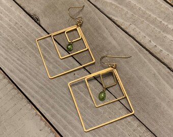 Semi-precious peridot faceted briolettes, suspended inside three graduated brass square shapes on 14k gold filled french hook earwires