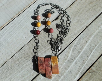 Red creek jasper stick bead pendant with red creek jasper bead accents on brushed silver necklace