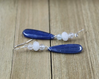 Polished kyanite teardrop with white topaz and moonstone suspended on 925 sterling silver ear wires