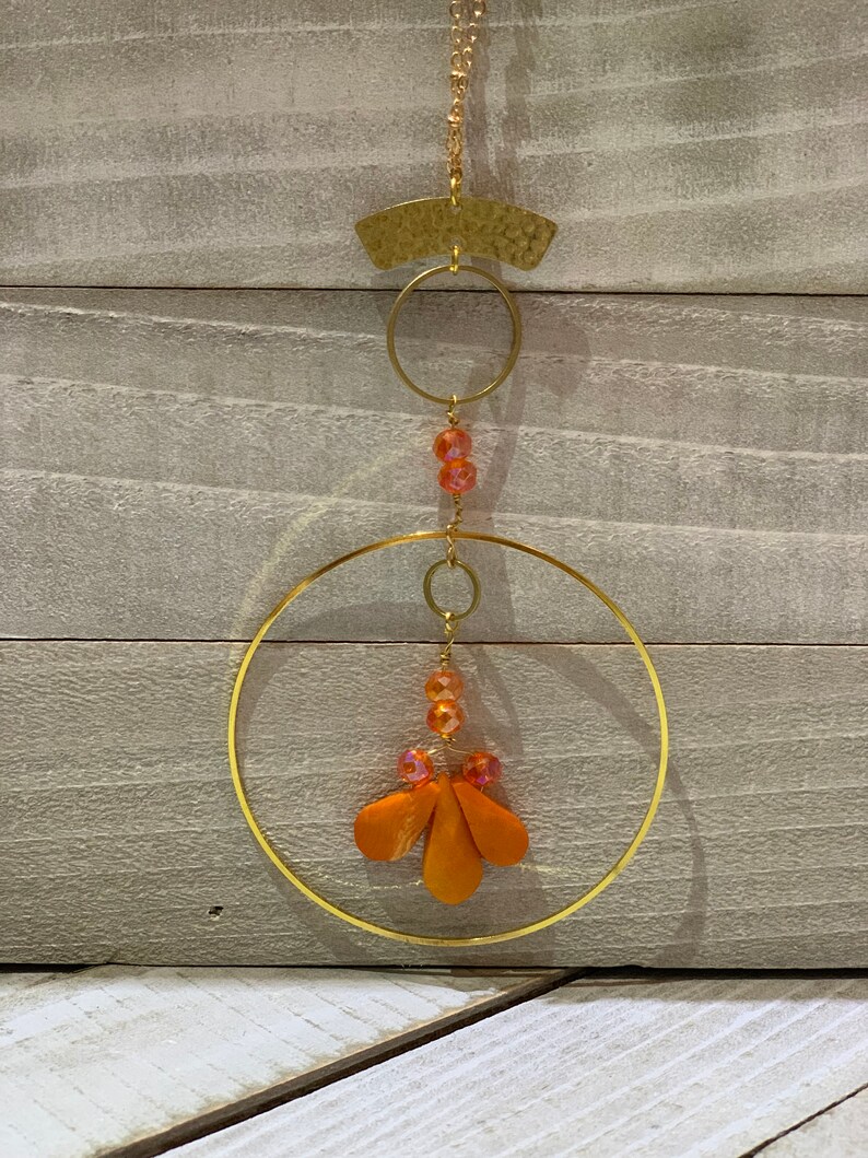 Faceted orange coral teardrops with czech glass beads hand wired to copper circle suspended on gold colored chain image 3