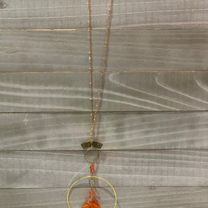 Faceted orange coral teardrops with czech glass beads hand wired to copper circle suspended on gold colored chain image 6