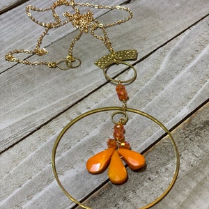 Faceted orange coral teardrops with czech glass beads hand wired to copper circle suspended on gold colored chain image 8