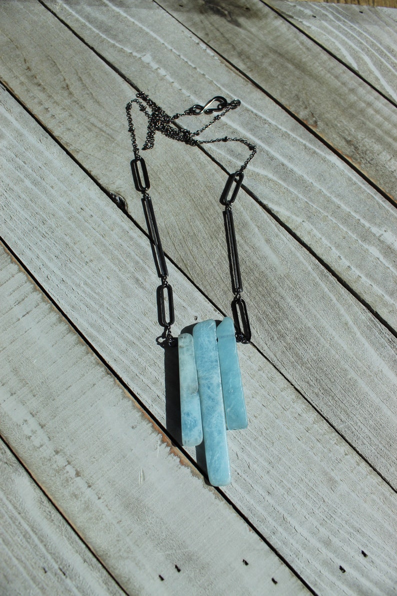 Raw aquamarine stick bead pendant with gunmetal geometric shapes on long gunmetal chain image 3