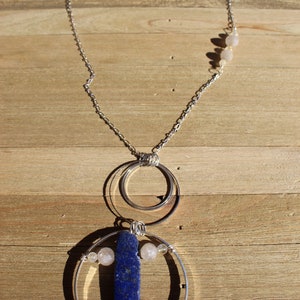 Lapis lazuli and rutile gold quartz floating inside silver circles with rutile quartz beads embedded in silver chain image 7