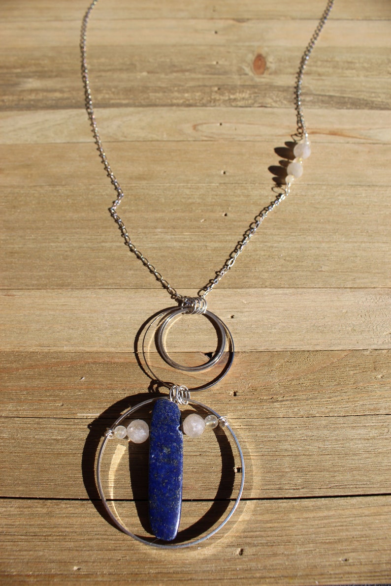 Lapis lazuli and rutile gold quartz floating inside silver circles with rutile quartz beads embedded in silver chain image 7