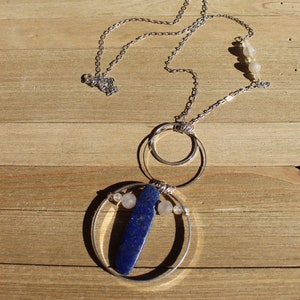 Lapis lazuli and rutile gold quartz floating inside silver circles with rutile quartz beads embedded in silver chain image 9