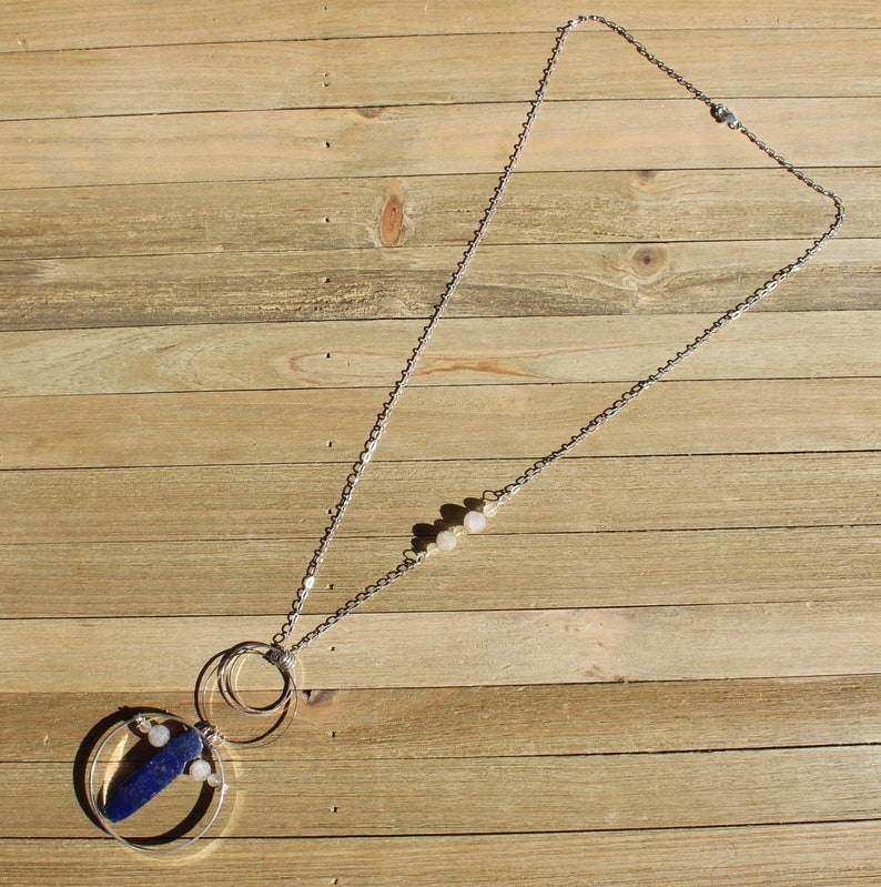 Lapis lazuli and rutile gold quartz floating inside silver circles with rutile quartz beads embedded in silver chain image 5