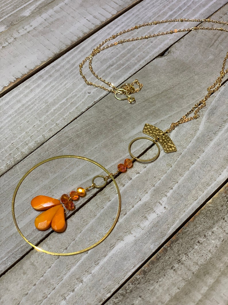 Faceted orange coral teardrops with czech glass beads hand wired to copper circle suspended on gold colored chain image 9