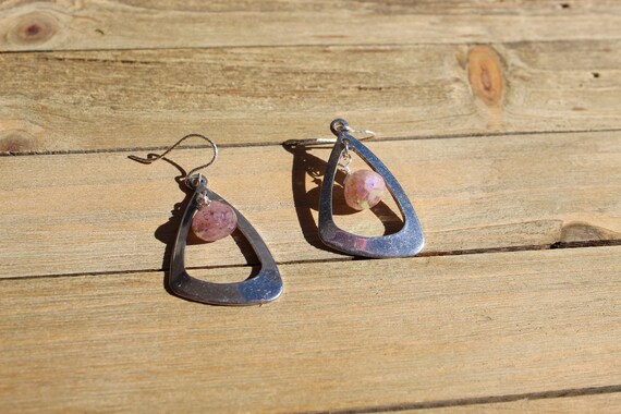 Faceted polished Russian muscovite onion beads suspended inside stainless steel triangle shapes, hanging from 925 sterling silver earwires