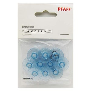 May include: A package of clear blue sewing machine bobbins. The bobbins are in a clear plastic bag with a white label that has the text "PFAFF" and the numbers "820779-096". The label also has the letters "A C D E F G".
