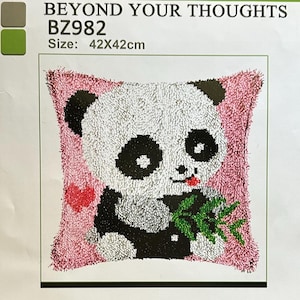 May include: Latch hook kit featuring a panda bear design. The kit includes pre-printed canvas, acrylic yarn, a hook tool, and a paper pattern. The finished size is 42x42cm.