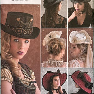 May include: Simplicity sewing pattern 8361 for Arkivestry hats, featuring four distinct headwear designs. The envelope displays a dark top hat with chain accents, a cream-colored ruffled hat with netting, and a wide-brimmed red lace hat with bows.