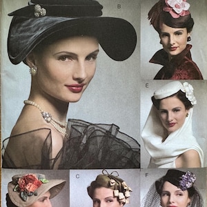 May include: Vogue Accessories sewing pattern V8276 featuring six distinct hat designs labeled A through F. The illustrations display various headwear styles including wide-brimmed hats, fascinators, and veils adorned with fabric flowers and embellishments.
