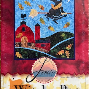 May include: A colorful quilt pattern featuring a witch flying on a broom over a barn, with autumn leaves and a crescent moon. The text "Witchy-Poo" is displayed at the bottom. Finished size is 23.5" x 26.5".