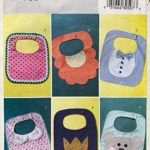 May include: A Butterick sewing pattern, B4533, featuring six different baby bib designs. The bibs include various shapes, patterns, and embellishments, such as polka dots, floral prints, and a bear face. The pattern is one size.