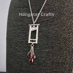 Guillotineketting met bloeddruppel