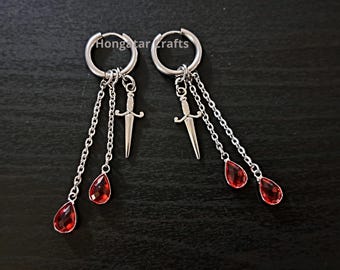 Pendientes de aro con forma de daga y gotas de sangre