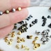 see more listings in the Mini Eyelets and Studs section
