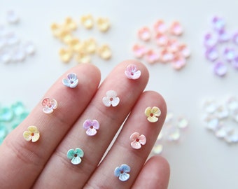 Flores de plástico brillantes súper pequeñas de 6mm/0,24 pulgadas, en 8 colores, suministros para manualidades, para adornos de ropa de muñeca/arte de uñas