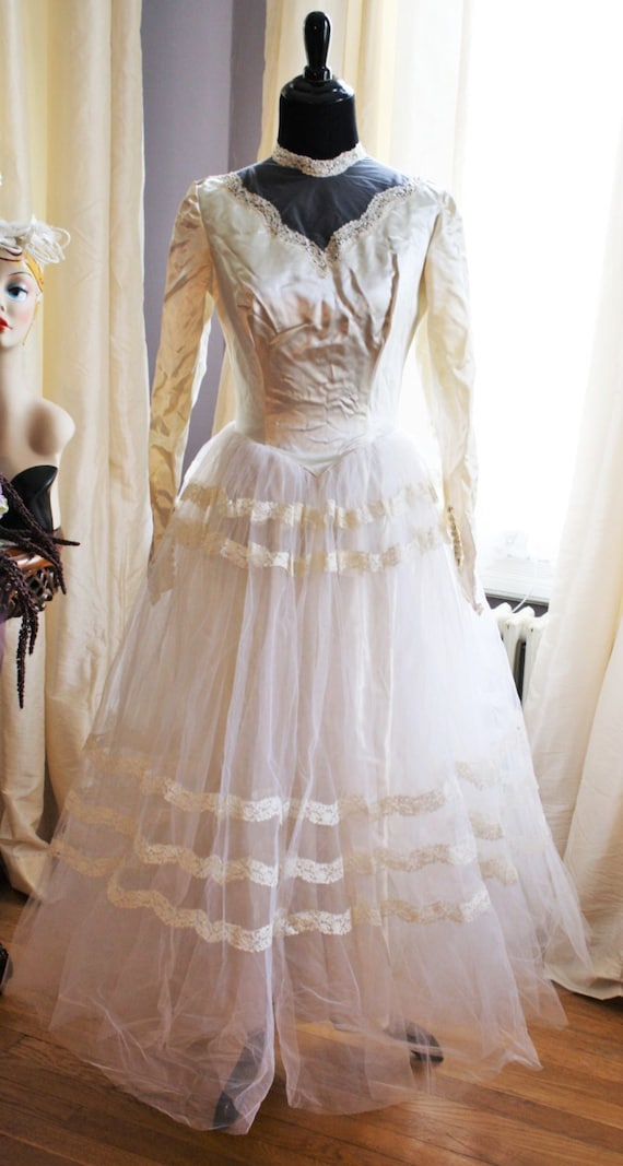 Ameri（アメリ）の「UND LACE TRIMMING DRESS（ワンピース