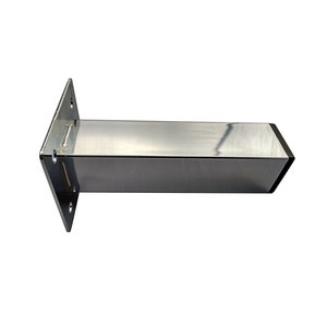 May include: A silver metal furniture leg with a square base and a rectangular mounting plate. The leg is approximately 10 inches long.