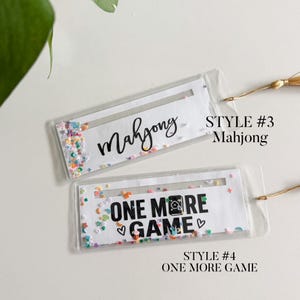 Mahjong-Linienleser, Shaker-Linienleser mit Konfetti im Inneren. Kann auch als Lesezeichen verwendet werden, Mahjong-Lesezeichen. Bild 4