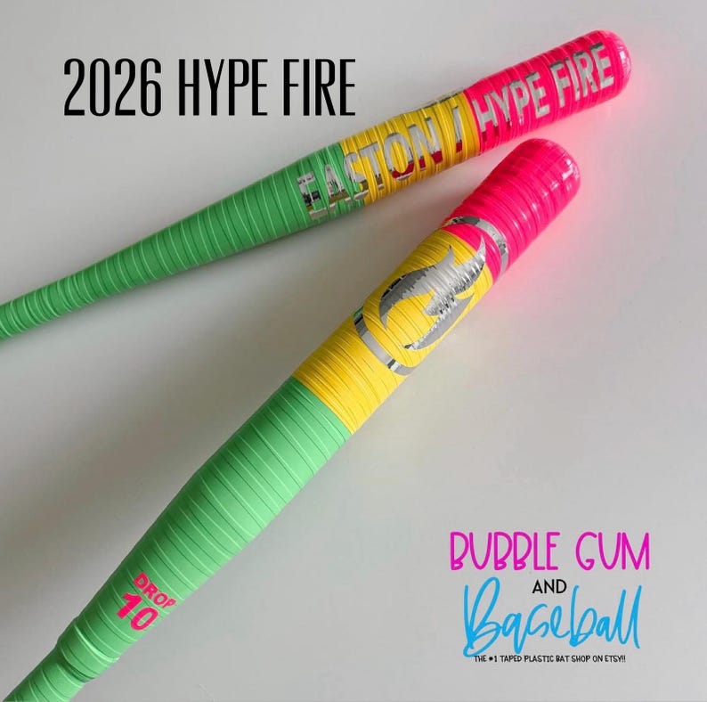 May include: Two baseball bats wrapped in neon green, yellow, and pink tape. The top bat features the text 2026 HYPE FIRE and EASTON HYPE FIRE. The bottom bat displays the text DROP 10. The image includes the text BUBBLE GUM AND BASEBALL.