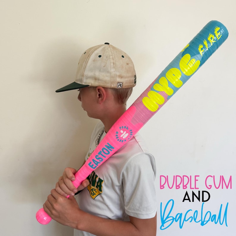 May include: A pink and blue baseball bat with the text "HYPER FIRE" and "EASTON". The bat is held by a person wearing a baseball cap and a white t-shirt. The image also includes the text "BUBBLE GUM AND Baseball".