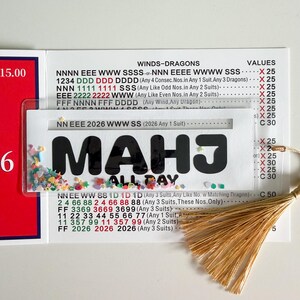 Mahjong-Linienleser, Shaker-Linienleser mit Konfetti im Inneren. Kann auch als Lesezeichen verwendet werden, Mahjong-Lesezeichen. Bild 10