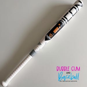 May include: A white and gray camouflage baseball bat with black and orange accents. The bat is 30 inches long and features the Rawlings logo and the word "CON". The grip is wrapped in white tape. The text "BUBBLE GUM and Baseball" is also visible.