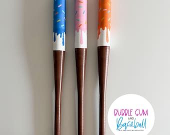 Bate de béisbol de plástico con cinta adhesiva Drippy Ice Cream, disponible en azul o rosa. Envío rápido.