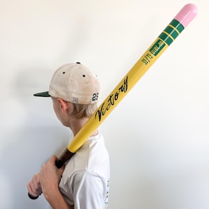 POPULAR Pencil bat, taped bat
