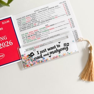Mahjong-Linienleser, Shaker-Linienleser mit Konfetti im Inneren. Kann auch als Lesezeichen verwendet werden, Mahjong-Lesezeichen. Bild 9