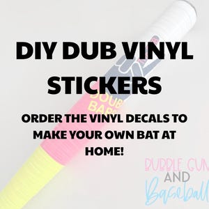 May include: A baseball bat with a white grip, yellow and pink accents, and a black and red sticker. The sticker reads "DIY DUB VINYL STICKERS" and "ORDER THE VINYL DECALS TO MAKE YOUR OWN BAT AT HOME!"