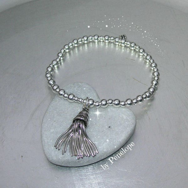 Bracelet perles et pompon en argent 925ème