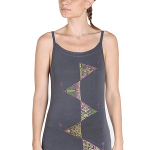 May include: A charcoal gray tank top with a geometric design featuring a series of triangles with intricate patterns in shades of green, pink, and yellow.